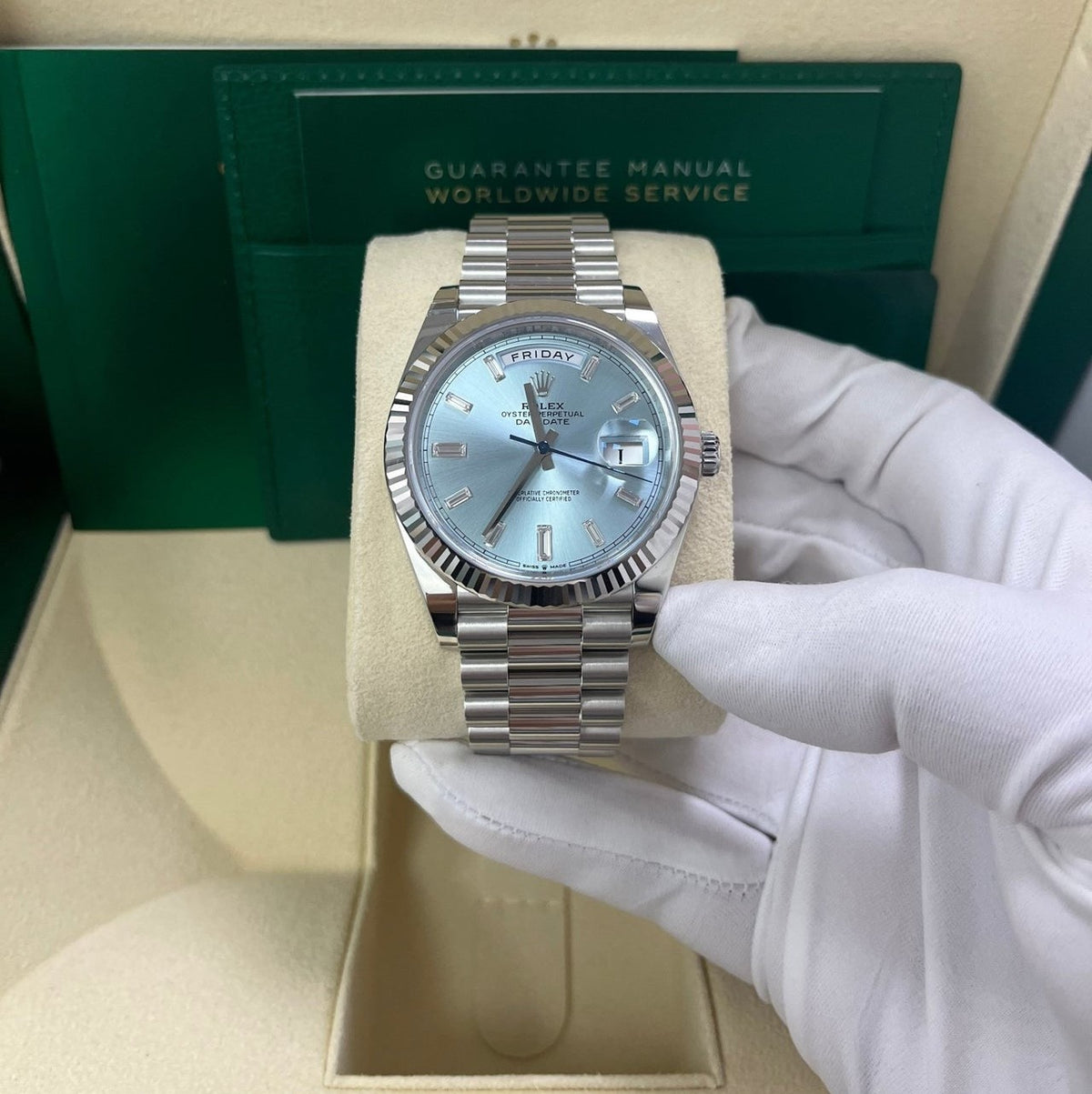 ROLEX DAY-DATE 40 PLATINUM ICE BLUE BAGUETTE DIAL 228236