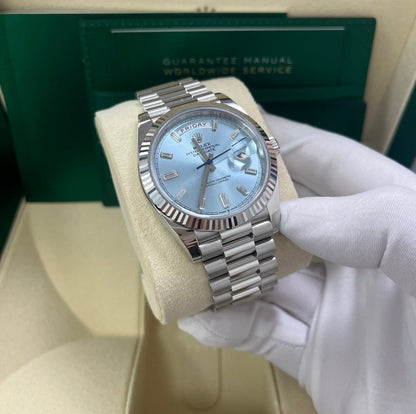 ROLEX DAY-DATE 40 PLATINUM ICE BLUE BAGUETTE DIAL 228236