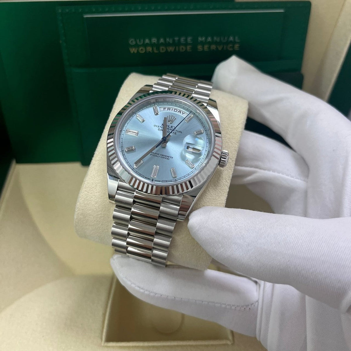ROLEX DAY-DATE 40 PLATINUM ICE BLUE BAGUETTE DIAL 228236