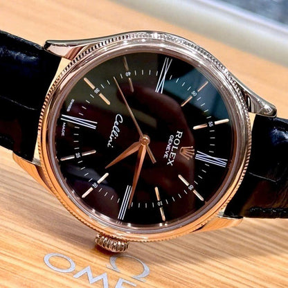 Swiss Rolex Cellini Black Dial Roman Numerals Gold Case Black Leather Strap